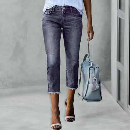Triana - Vaqueros de denim desgastado de corte ajustado