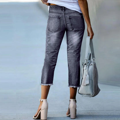 Triana - Vaqueros de denim desgastado de corte ajustado